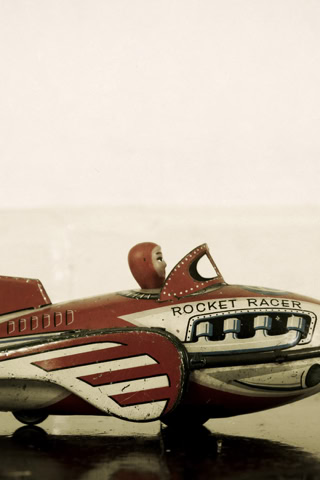 Antique rocket racer toy